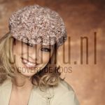 25-01-2005 Antje Monteiro at studio in Amsterdam, January 25, 2005.

[keywords]Posed, Headshot, Smiling, Cap[/keywords]